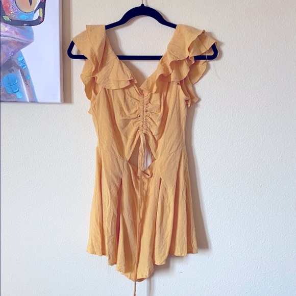 Yellow open back romper